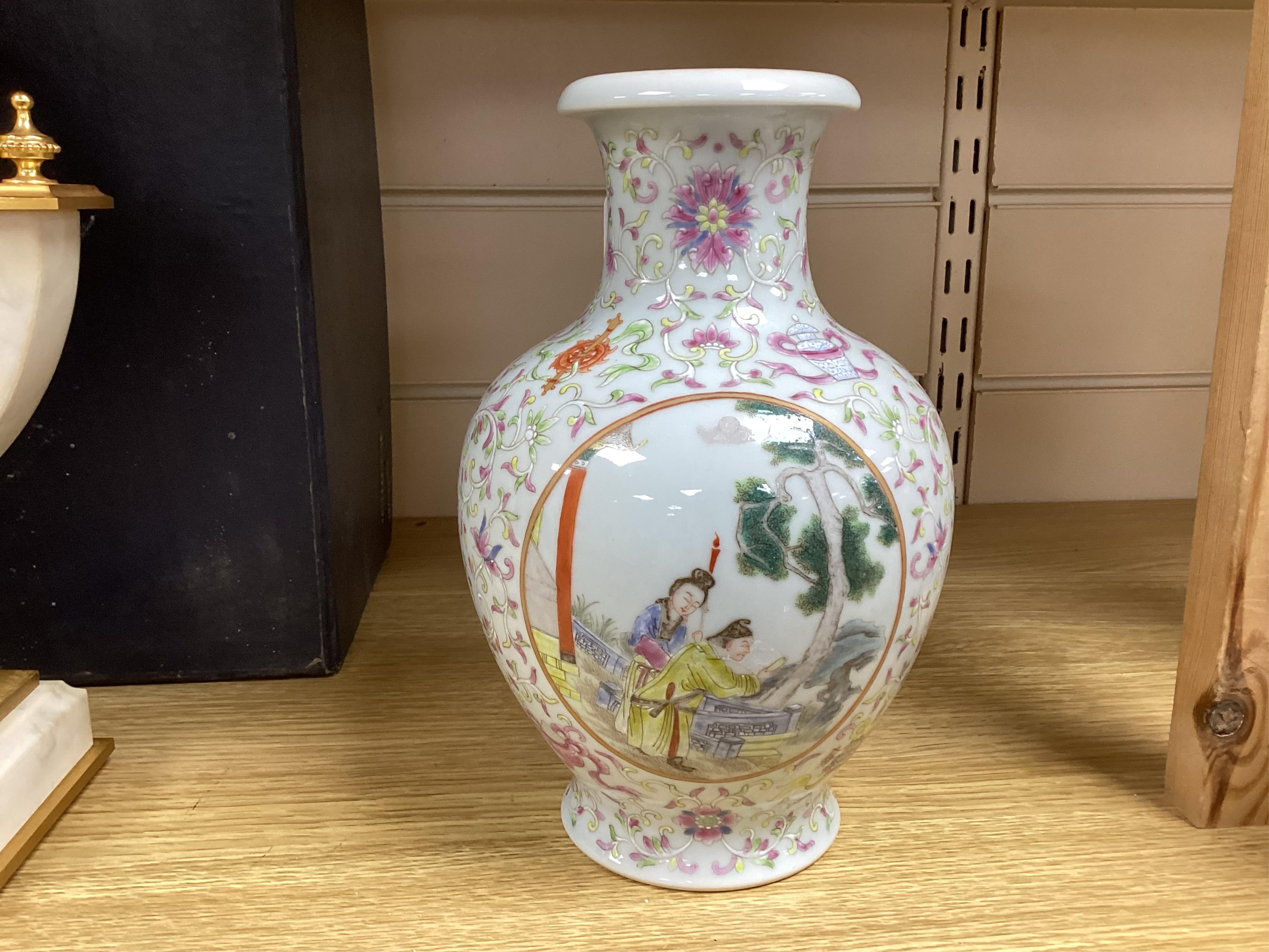 A Chinese famille rose vase, a powder box and an enamelled vase, largest 21cm high